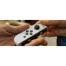 Ігрова приставка портативна Nintendo Switch OLED (White) - фото 9 Ігрова приставка портативна Nintendo Switch OLED (White) - фото 9